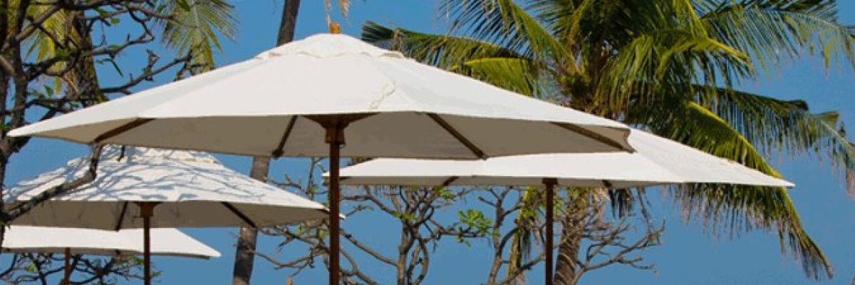 Heavy Duty Market Umbrellas on a poolside restaurant deck - White
